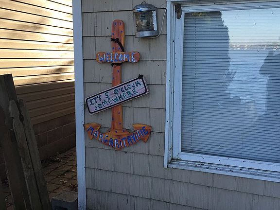 On the deck looking at the Bedroom window