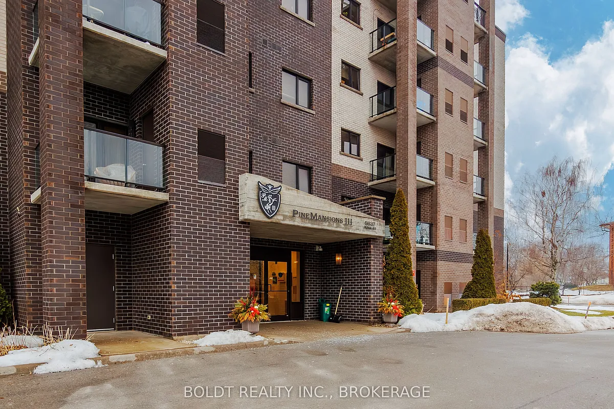 Building Photo - 5837 Dunn St #305