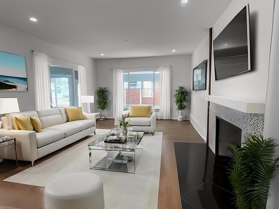 Spacious living room with fire place.