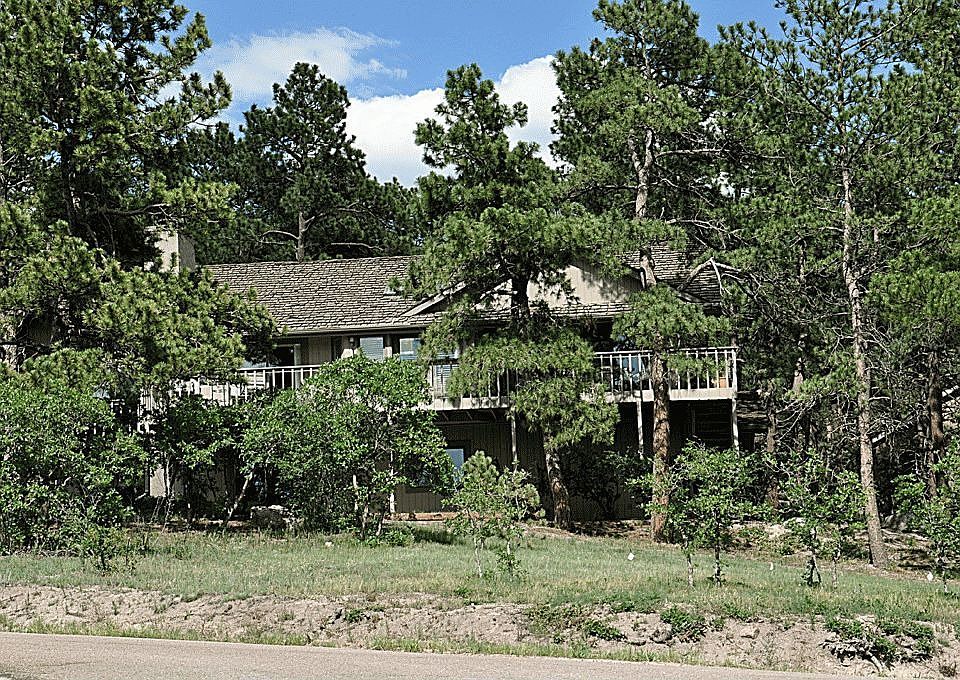 Wooded lot with pikes peak views