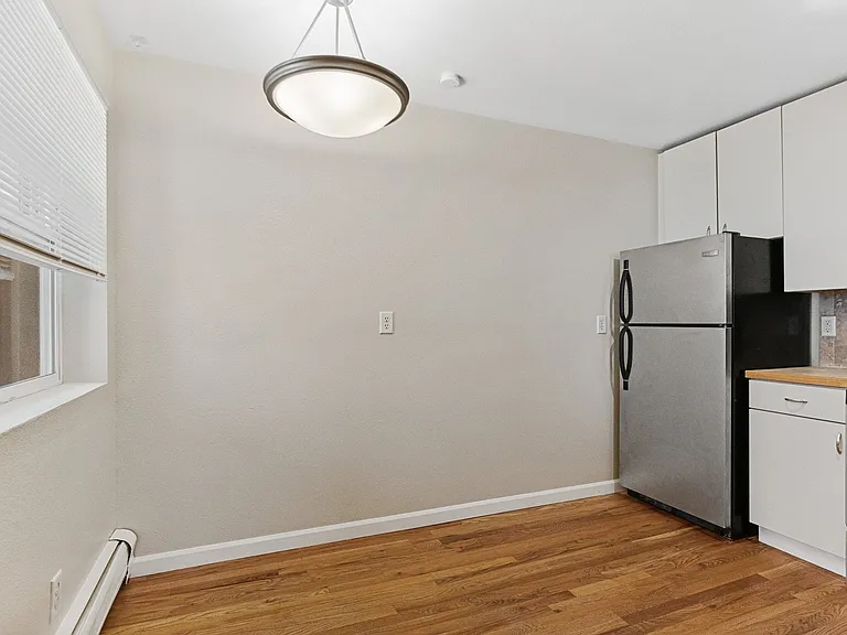 1940 W 32nd Ave #202 — Photo 18