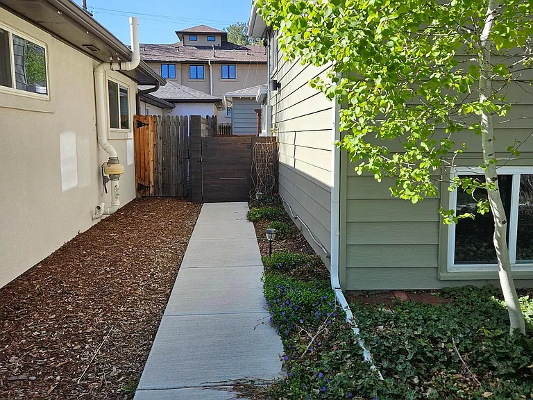 Side walkway and gate entrance.