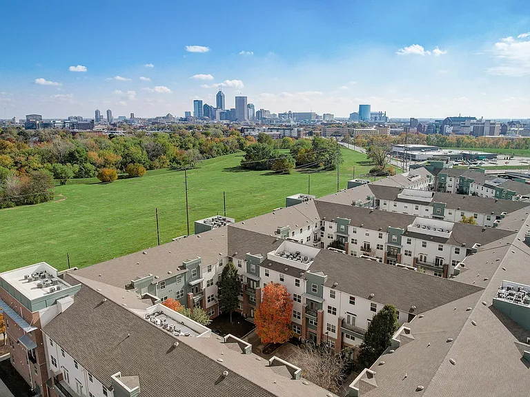 Stunning Aerial View of Ralston Apartments with Downtown Indianapolis Skyline