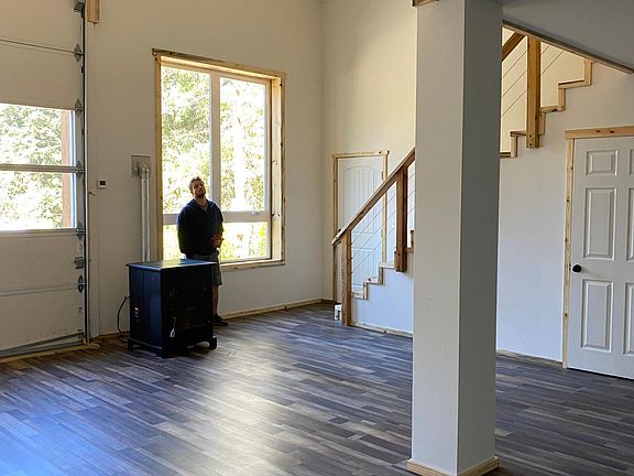 Looking out from kitchen area. Huge bay window.