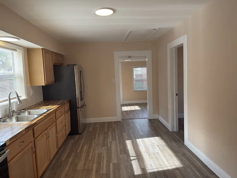 Kitchen Facing bonus room straight ahead and 3rd bedroom on right