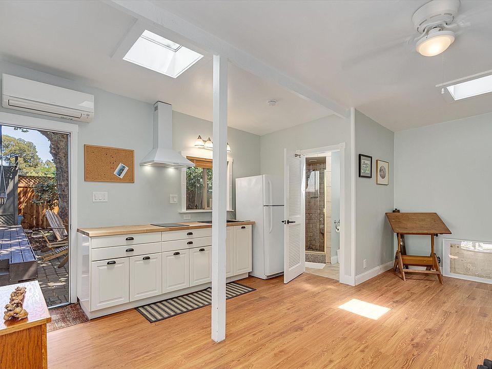 Counter area and fridge.