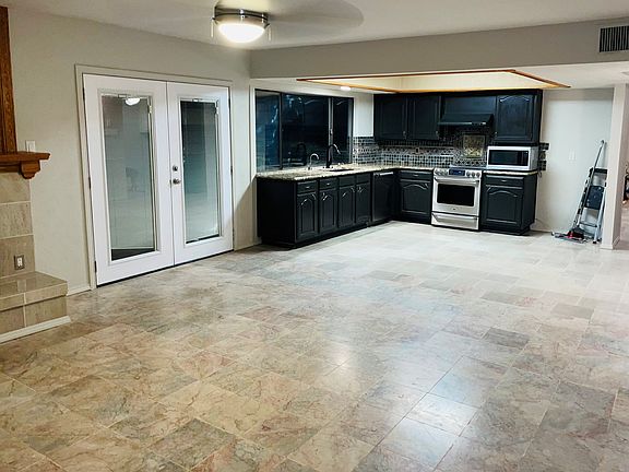 View of kitchen from back den or the living room