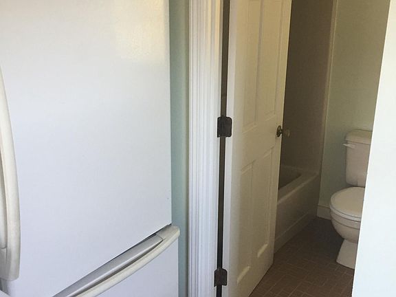 entrance to bathroom off kitchen