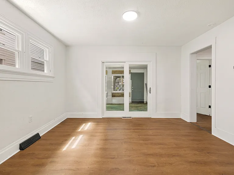 Dining room leading to the sunroom/ kitchen