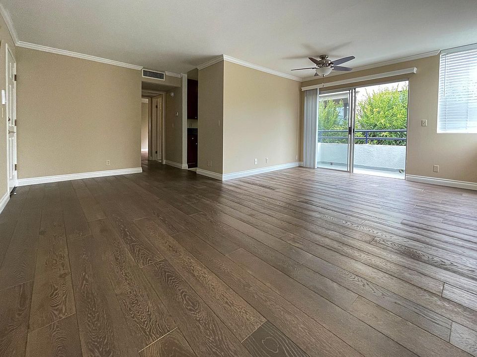 High-end hardwood floors, custom paint and crown molding
