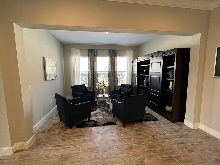 Sitting area open to kitchen and living room