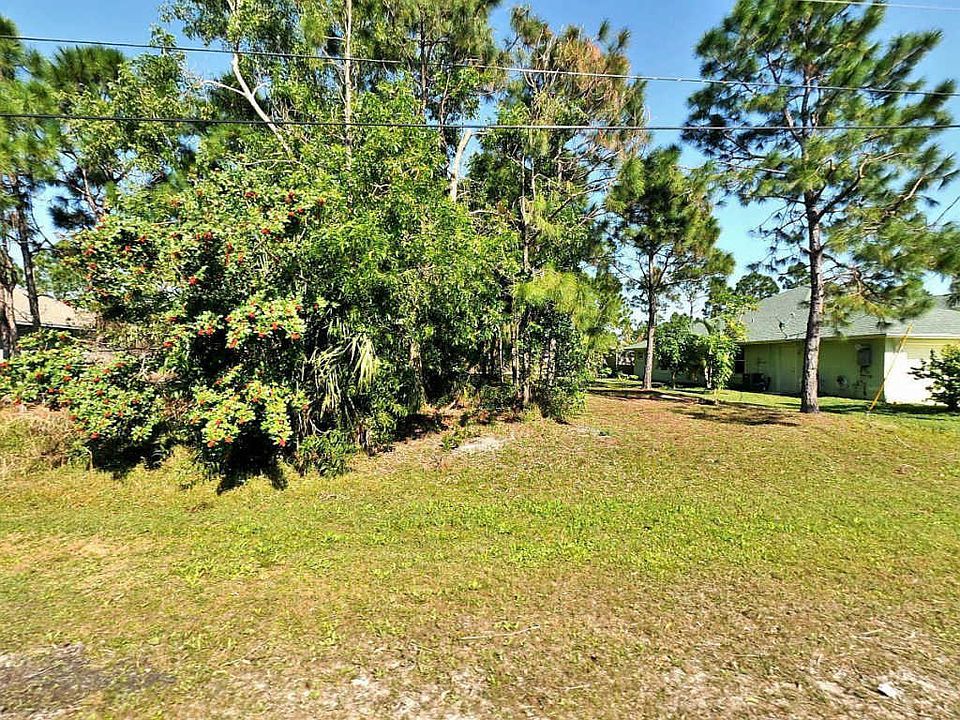 1st image of 5566 NW Cruzan Ave