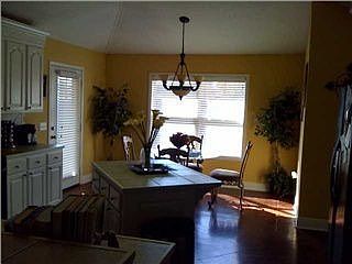 Large kitchen with tons of cabinets.