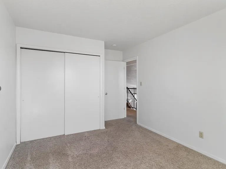 3rd bedroom with view of the closet