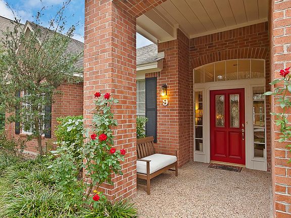 Large covered entry way that leads to a beautifully updated home.
