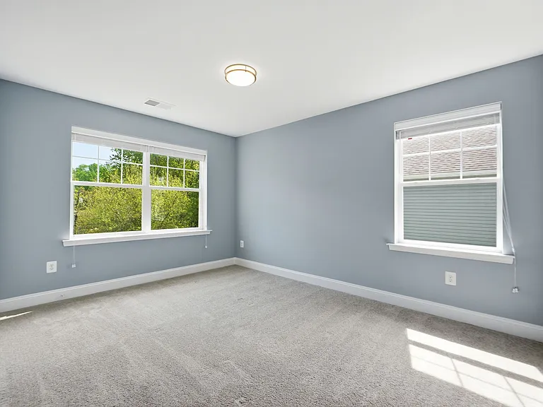 One of three large upstairs bedrooms with closet (in addition to upstairs master).