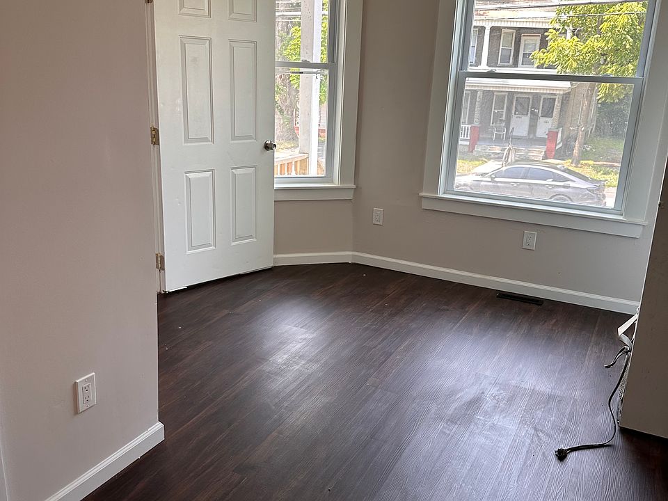 LIVING ROOM VIEW OF THE STREET WITH LARGE WINDOWS FOR ADDITIONAL LIGHTS