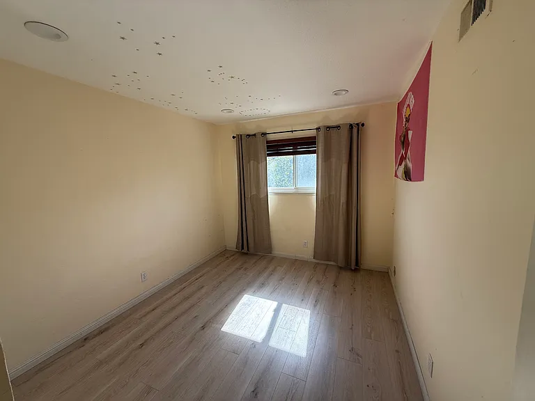 Bedroom 3 with new wooden flooring