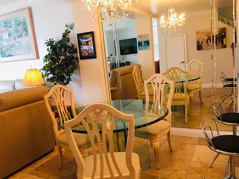 Bright sunny oceanfront FURNISHED Vacation Smoke/Pet-FREE condo for SINGLE Occupancy .