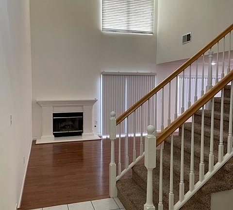 Entry Way. High ceilings. Fireplace. Central AC and Heat.