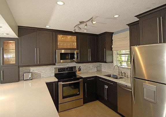 New Custom Kitchen with Stainless Steel Appliances.