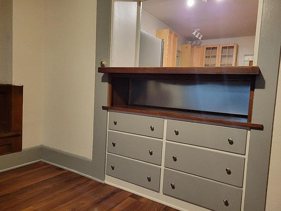 Built in cabinets and pass through to kitchen!