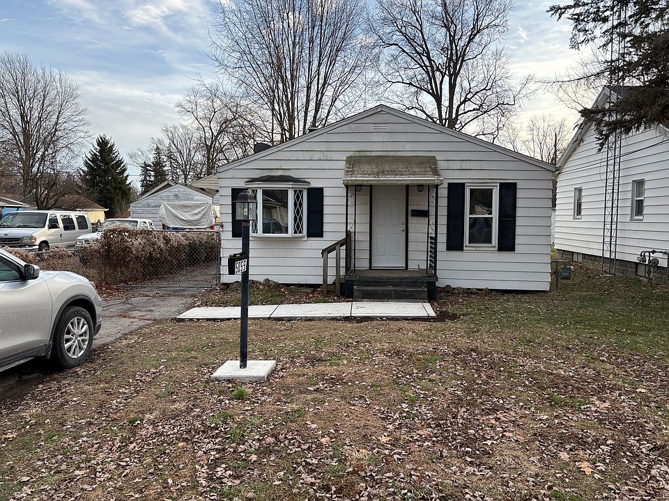 Front of house with new side walk