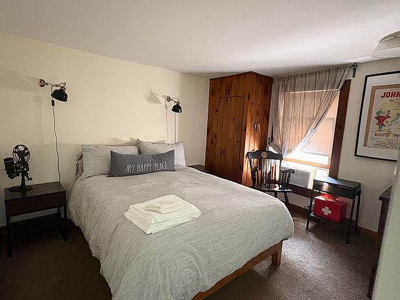 Bedroom #2 with Queen bed and small closet on second floor.