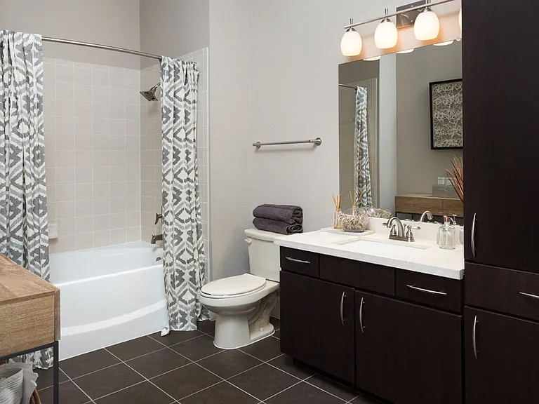 Limestone countertops vanities with espresso cabinets