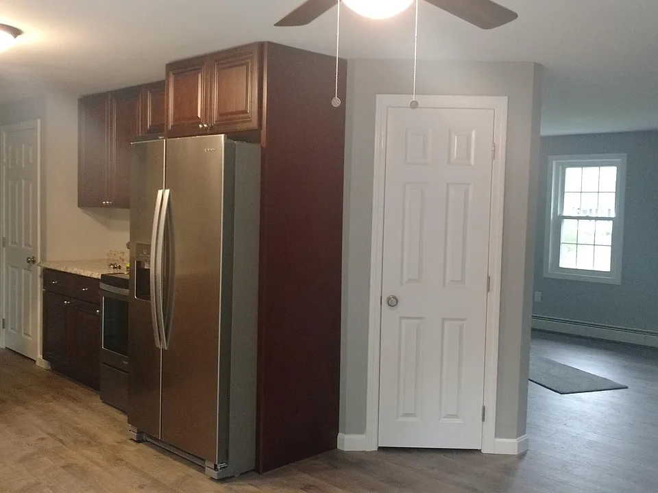 Kitchen open to living room. Closet is built in pantry