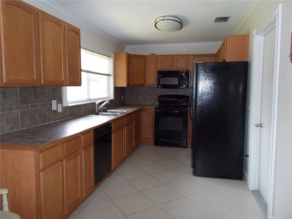 5th image of 2734 SE Buccaneer Cir
