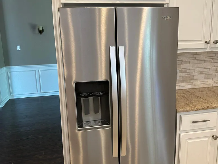 Counter depth refrigerator by Whirlpool.