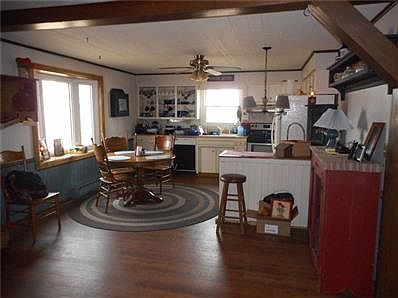 Warmly Inviting Country Kitchen with Bay Window View of the Wooded Lot!