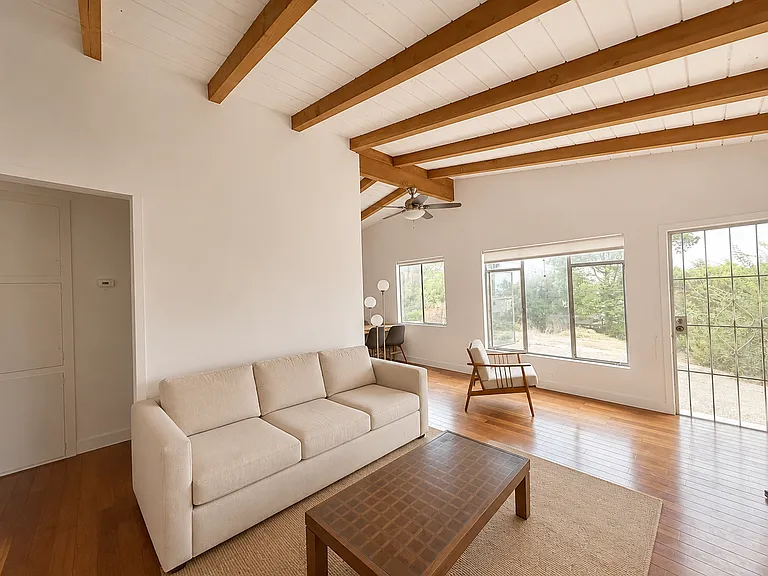 Living room - hallway entrance includes a pocket door for increased privacy