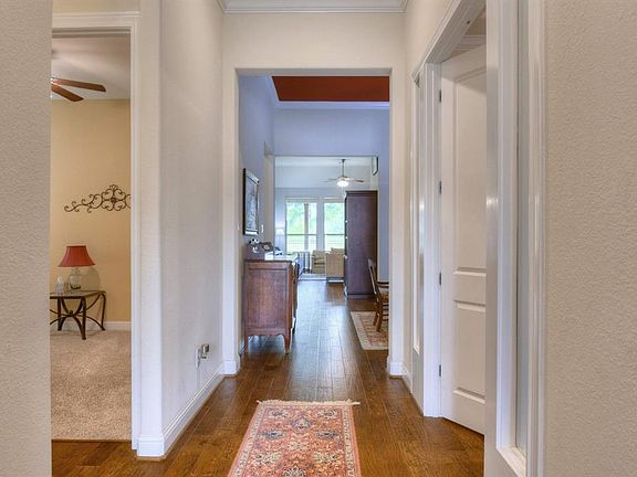 View as you enter through the front door, study on the right, 2nd and 3rd bedroom to the left