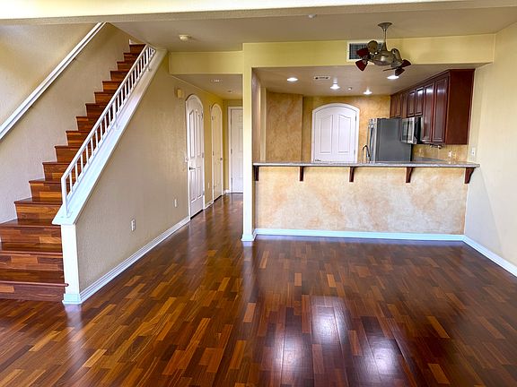 Downstairs living & dining area. 
Built in fan and lighting over dining space.