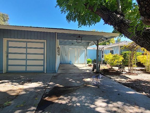 Carport and assigned driveway