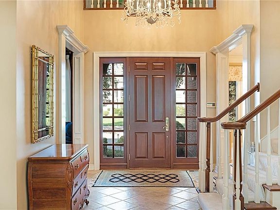 2 Story Entry and wonderful sidelights inviting you into this elegant home
