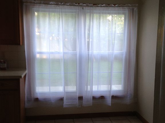 kitchen area overlooking back yard