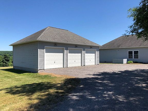 3 car heated detached garage
