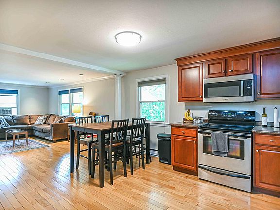 Open concept top floor unit; stainless appliances, hw floors, new lighting.