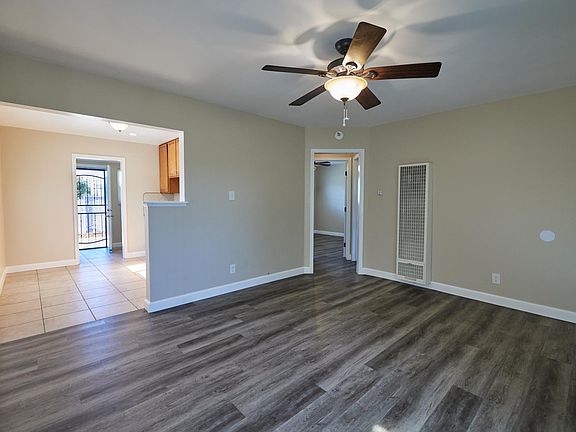 View from living room facing kitchen and hallway.