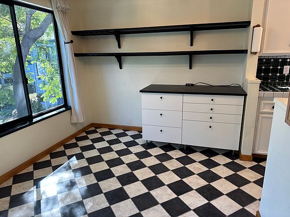Dining room with extra storage and countertop.