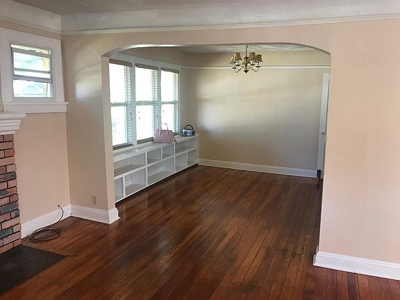 Dinning room has great light and original built in book case