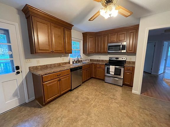 Kitchen with dishwasher and stove.
14' x 12'