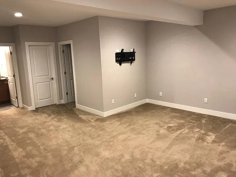 Basement walk-in closet. TV wall mount.