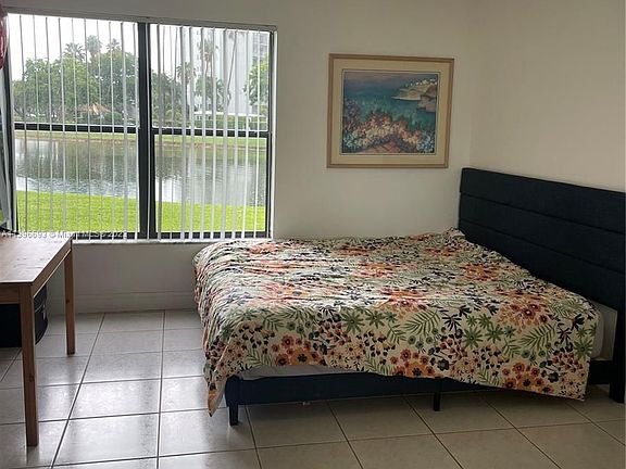 2nd image of 2309 S Cypress Bend Dr APT 115B