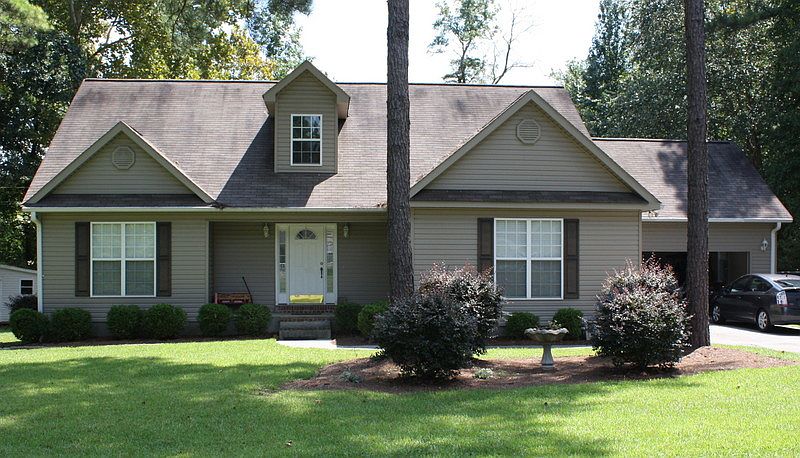 Front
						:
						Lanscaped Lawn, Shaded Yard