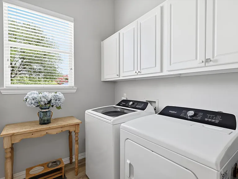 Laundry room 1st floor with storage