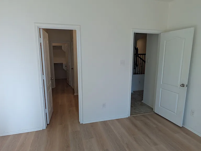 Master bedroom - looking into the bathroom and hallway